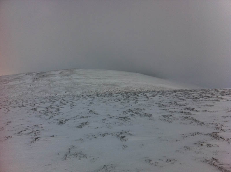 View North to the munro top with the summit in the clag