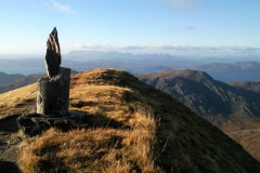 Ladhar Bhein trig point with Skye in the distance Ladhar Bhein trig point with Skye in the distance