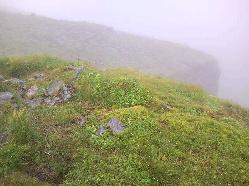 21 Over the edge of the cairn in the mist