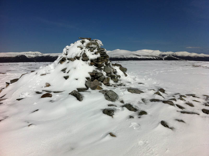 An Sgarsoch summitwith high Cairngorms in background